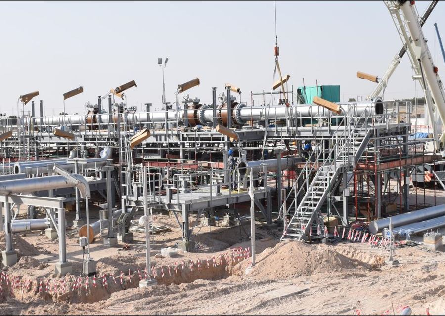 Manifold platform under construction, with pipework and valves on a steel deck