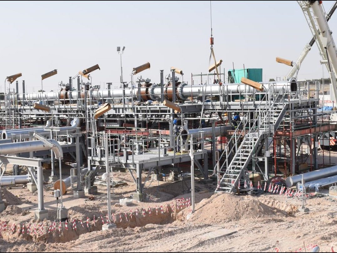Manifold platform under construction, with pipework and valves on a steel deck